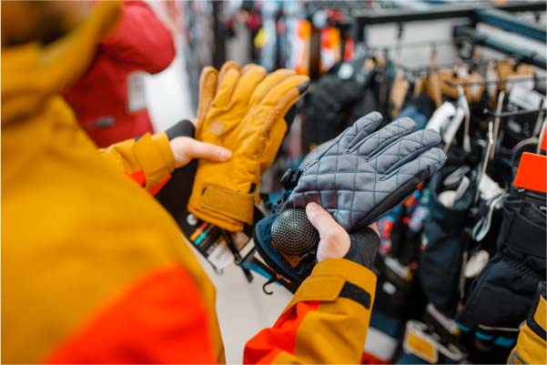 Acheter une paire de gants en magasin de sport